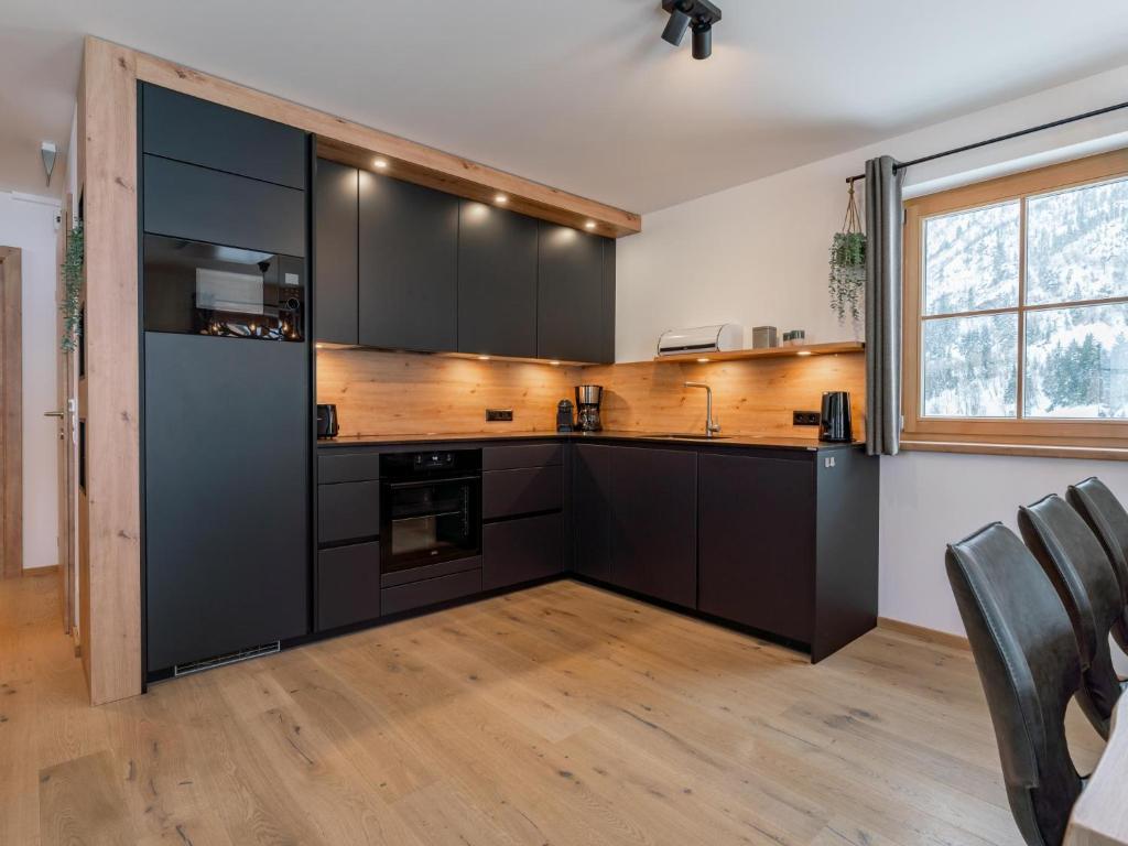 Kuchyň nebo kuchyňský kout v ubytování Chalet Pretzel