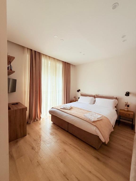 Postel nebo postele na pokoji v ubytování Bala Dream House