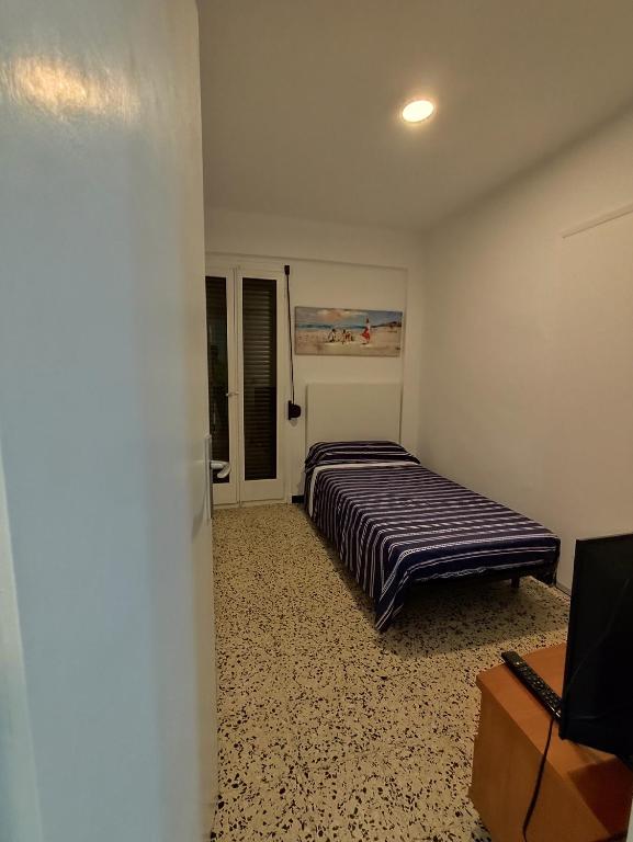 Posteľ alebo postele v izbe v ubytovaní Playa Cambrils Salou B