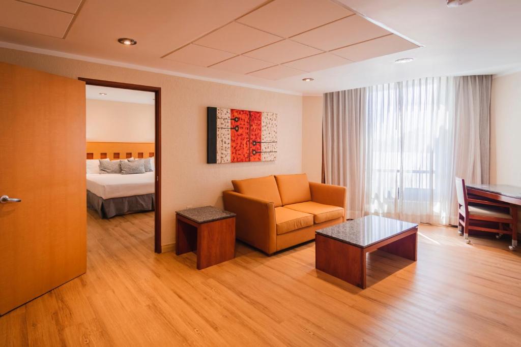 Postel nebo postele na pokoji v ubytování Hotel Mirabel