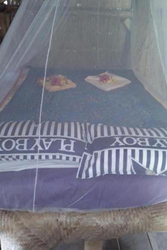 Postel nebo postele na pokoji v ubytování Tannawildpig
