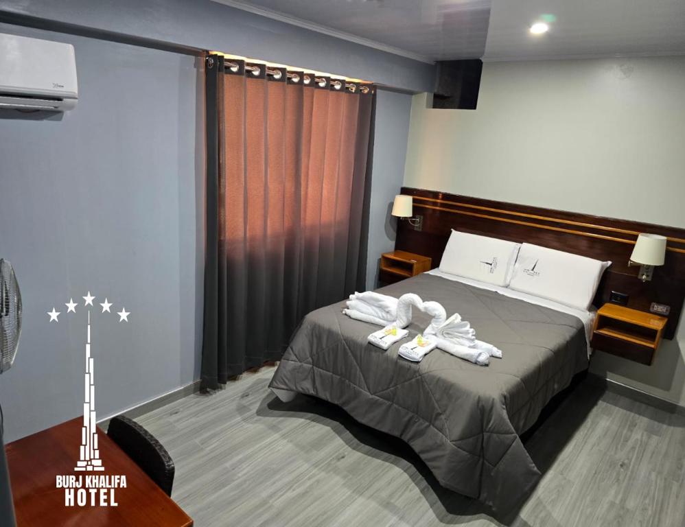 Cama o camas de una habitación en Hotel Burj Khalifa