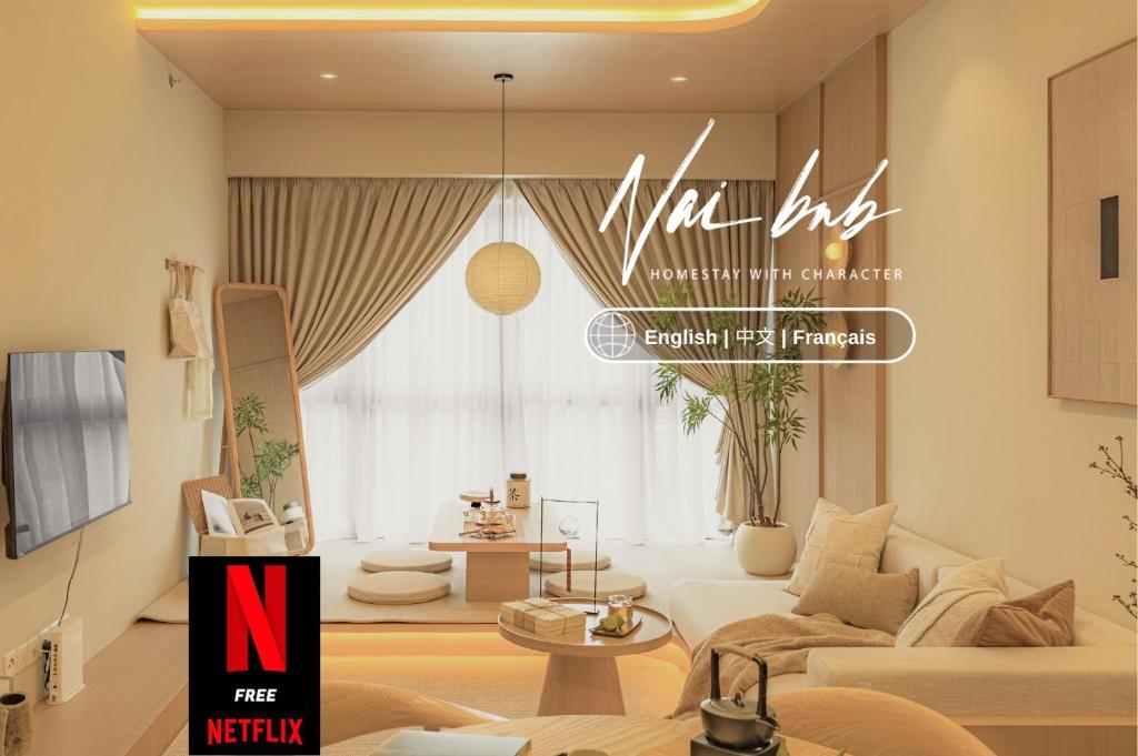 a living room with a couch and a table at NaiBnB in Agile Bukit Bintang - 5 mins walk to TRX in Kuala Lumpur