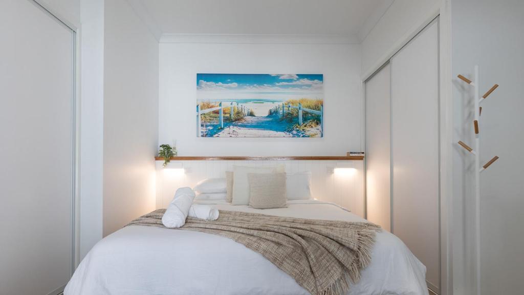 Postel nebo postele na pokoji v ubytování Beachcomber in Agnes