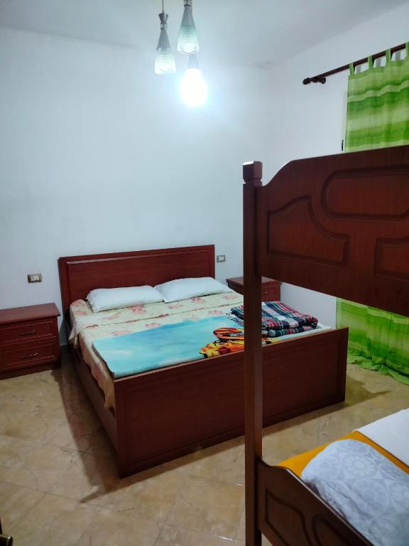 Postel nebo postele na pokoji v ubytování Backpackers Casa De Payaso