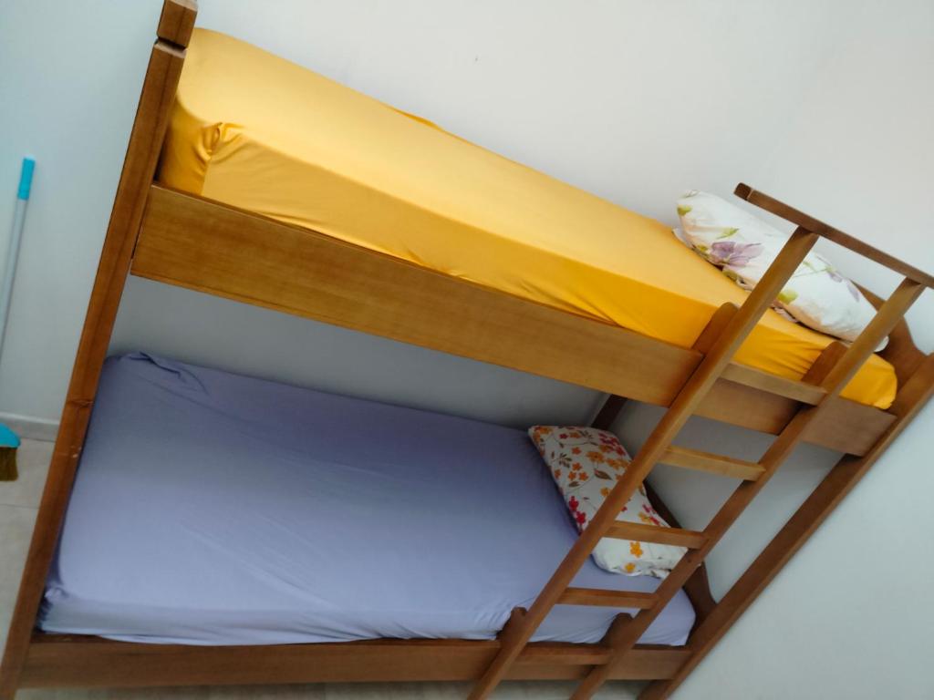 Postel nebo postele na pokoji v ubytování Backpackers Casa De Payaso