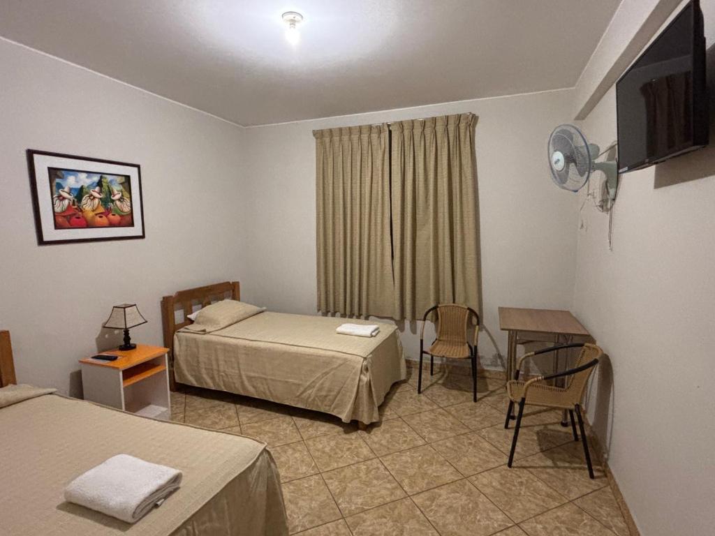 Postel nebo postele na pokoji v ubytování Hospedaje el Telar