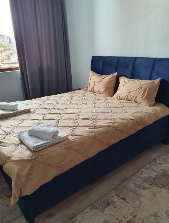 A bed or beds in a room at Didi House