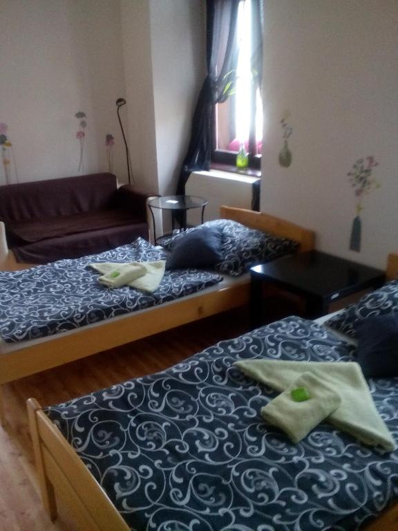 Postel nebo postele na pokoji v ubytování Penzion Willa