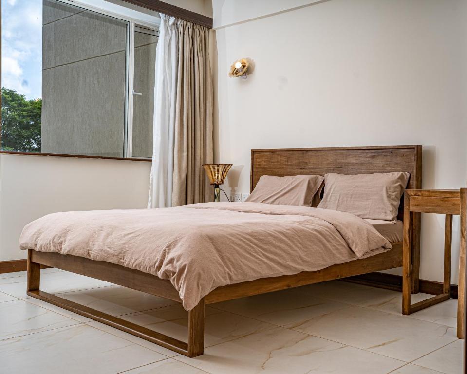 Postel nebo postele na pokoji v ubytování Silvermist Two & Three Bedrooms Wonderiss Homes Westland Living with close proximity to UN, Karura forest & Sarit Mall