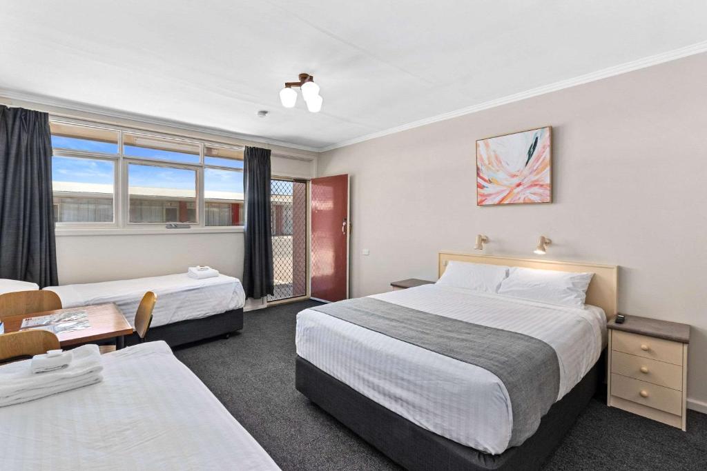 Postel nebo postele na pokoji v ubytování Econo Lodge Port Augusta