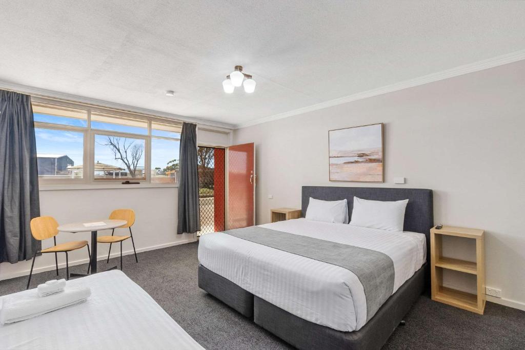 Postel nebo postele na pokoji v ubytování Econo Lodge Port Augusta