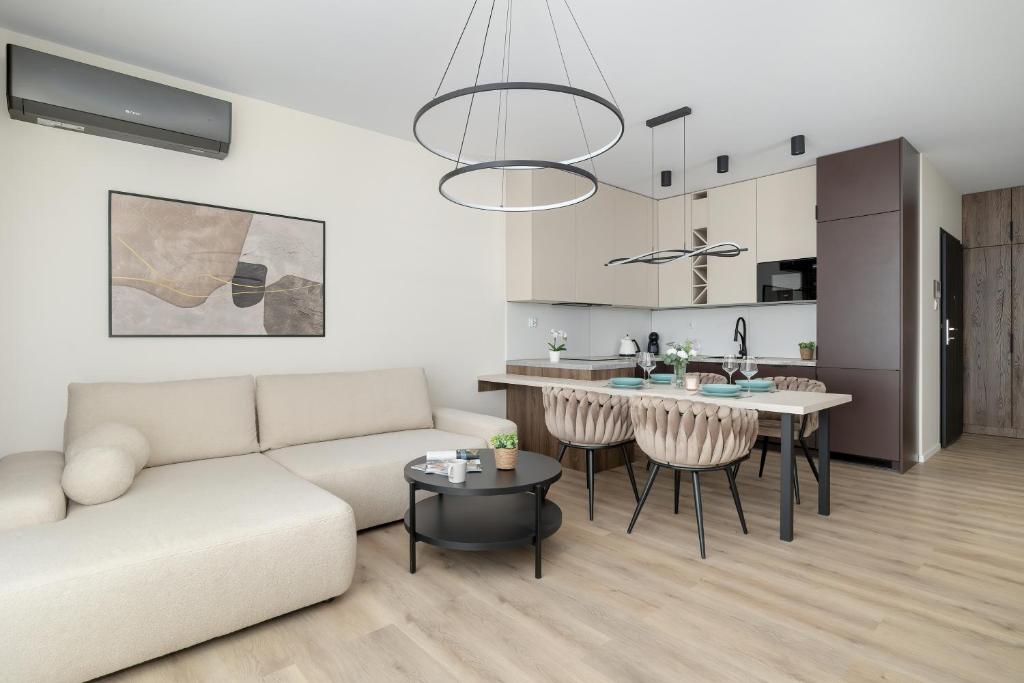 Posedenie v ubytovaní Wiślane Tarasy Lux Apartments Cracow by Renters Prestige