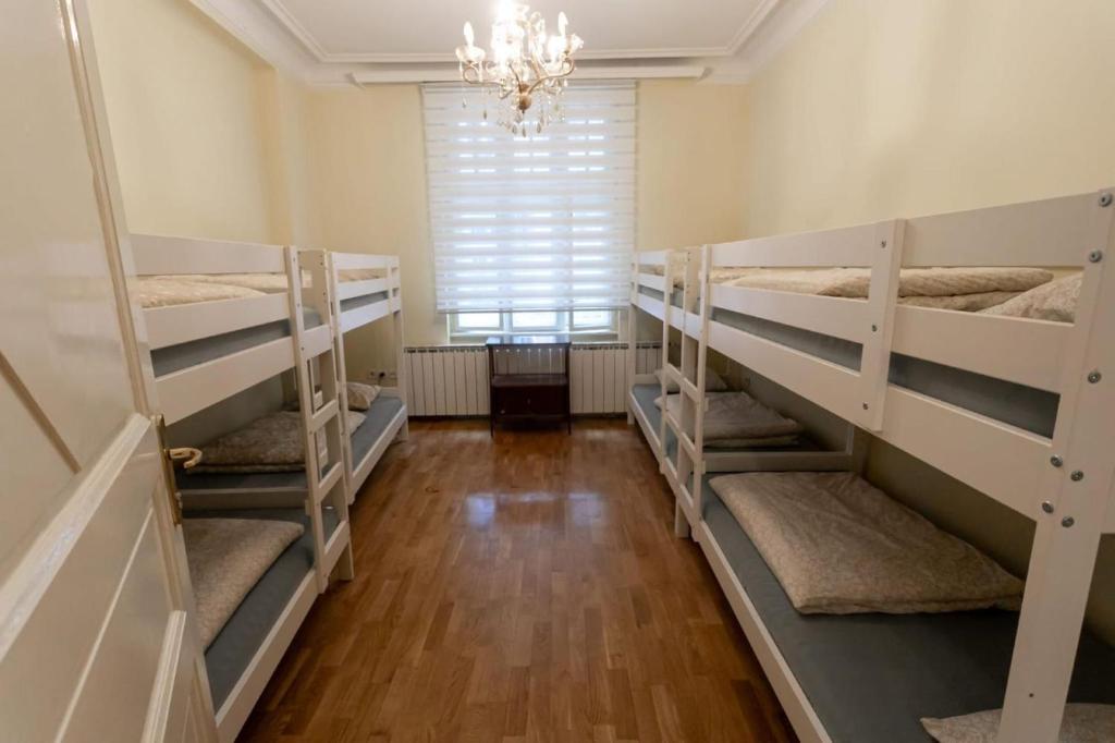 Posteľ alebo postele v izbe v ubytovaní K Nest
