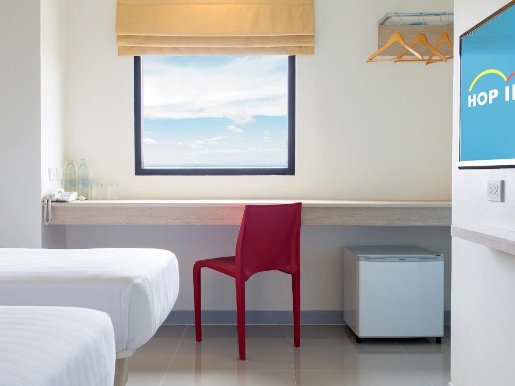 Postel nebo postele na pokoji v ubytování HOP INN Krabi Building B