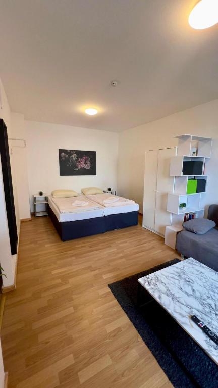 Postel nebo postele na pokoji v ubytování Praktische City Apartments direkt am Hauptbahnhof