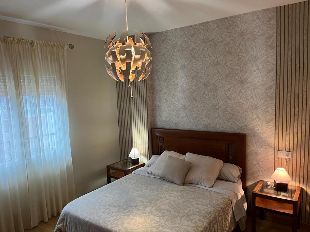 Postel nebo postele na pokoji v ubytování San Miguel