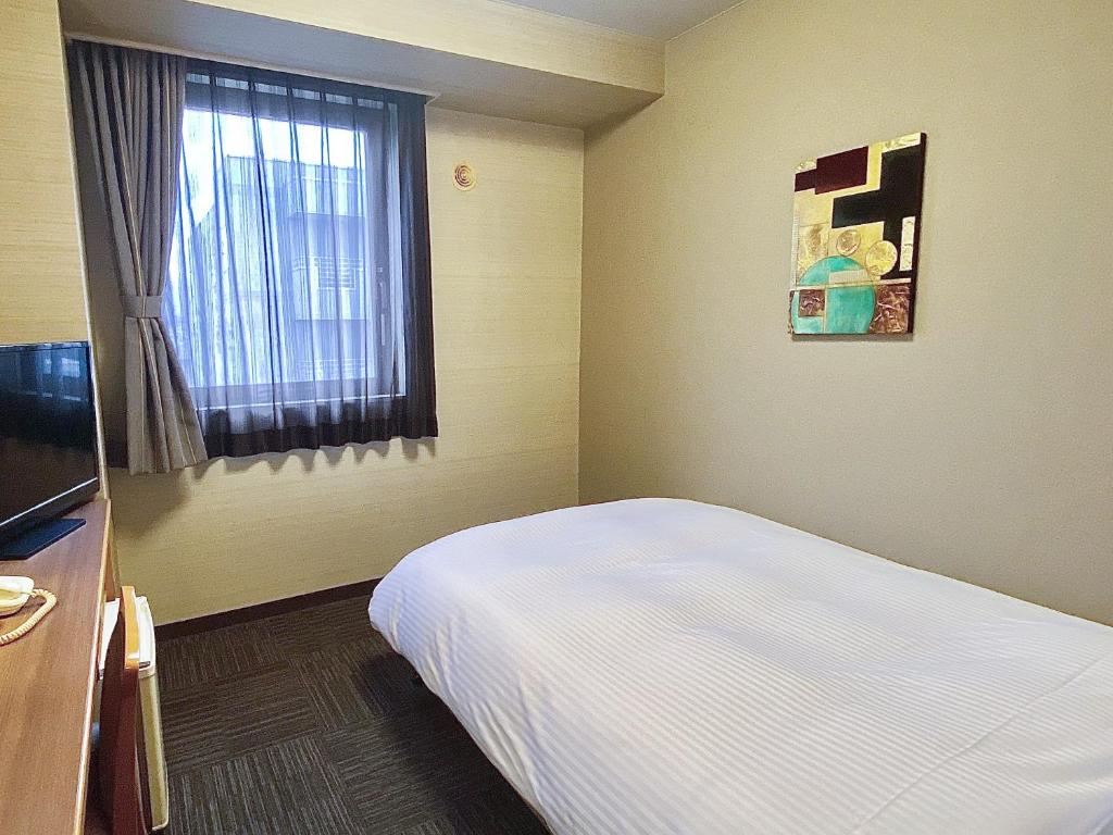 TV a/nebo společenská místnost v ubytování Hotel Route-Inn Shimada Yoshida Inter