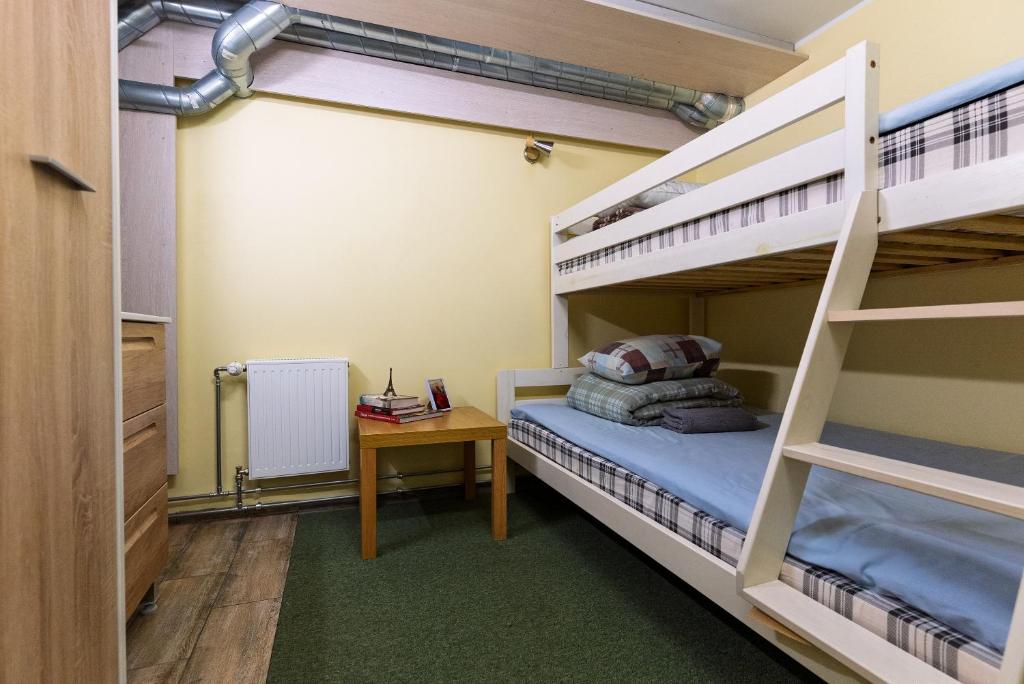 Postel nebo postele na pokoji v ubytování IDA Apartments