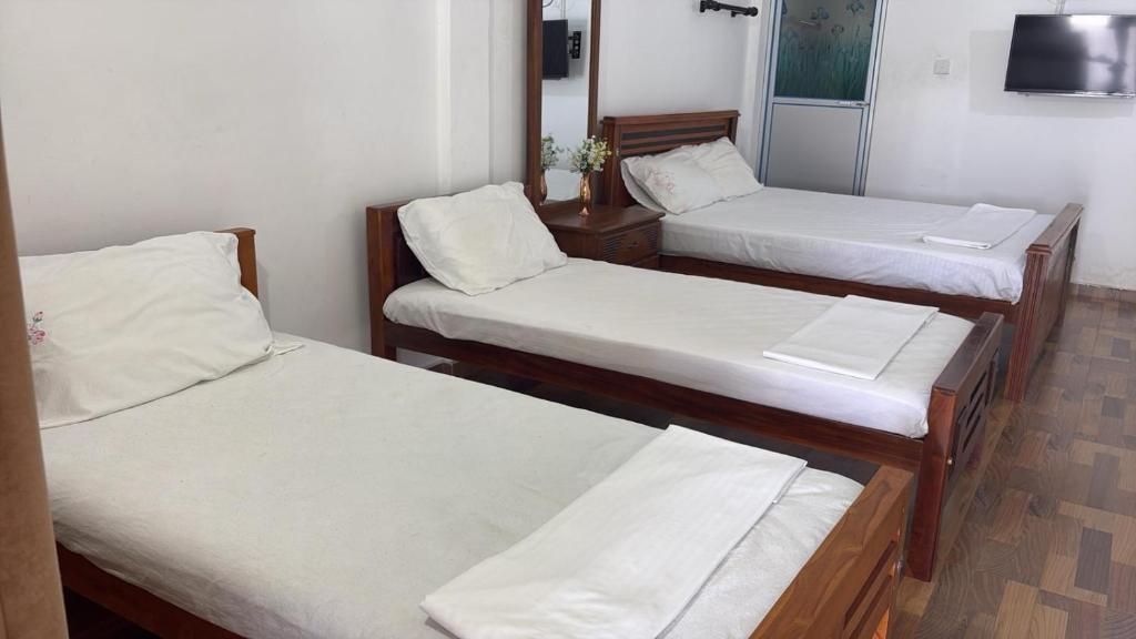 Postel nebo postele na pokoji v ubytování Lagoon Breeze Resort