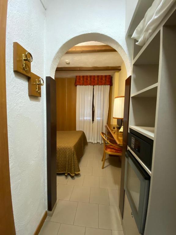 Postel nebo postele na pokoji v ubytování Hotel Sila