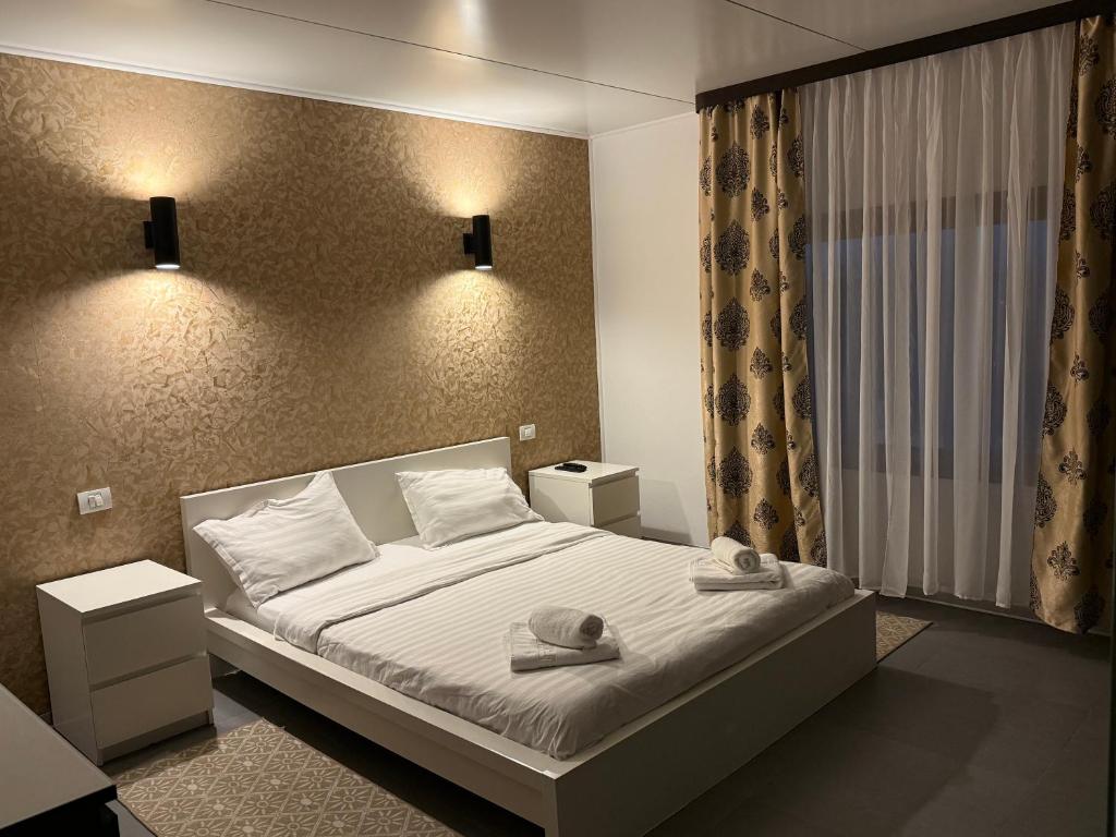 Postel nebo postele na pokoji v ubytování Rodizio Hill Resort