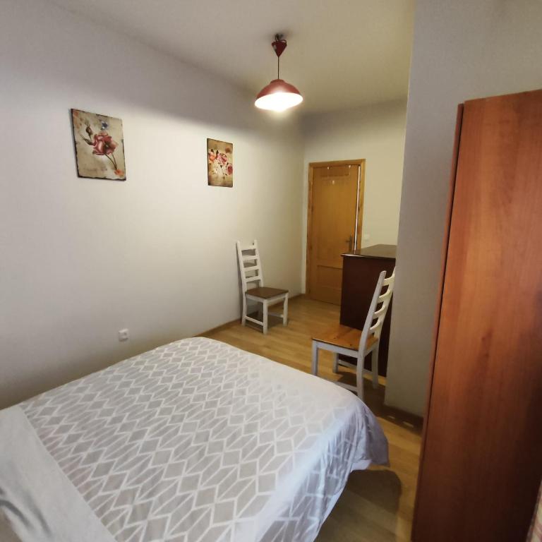 Postel nebo postele na pokoji v ubytování San Miguel