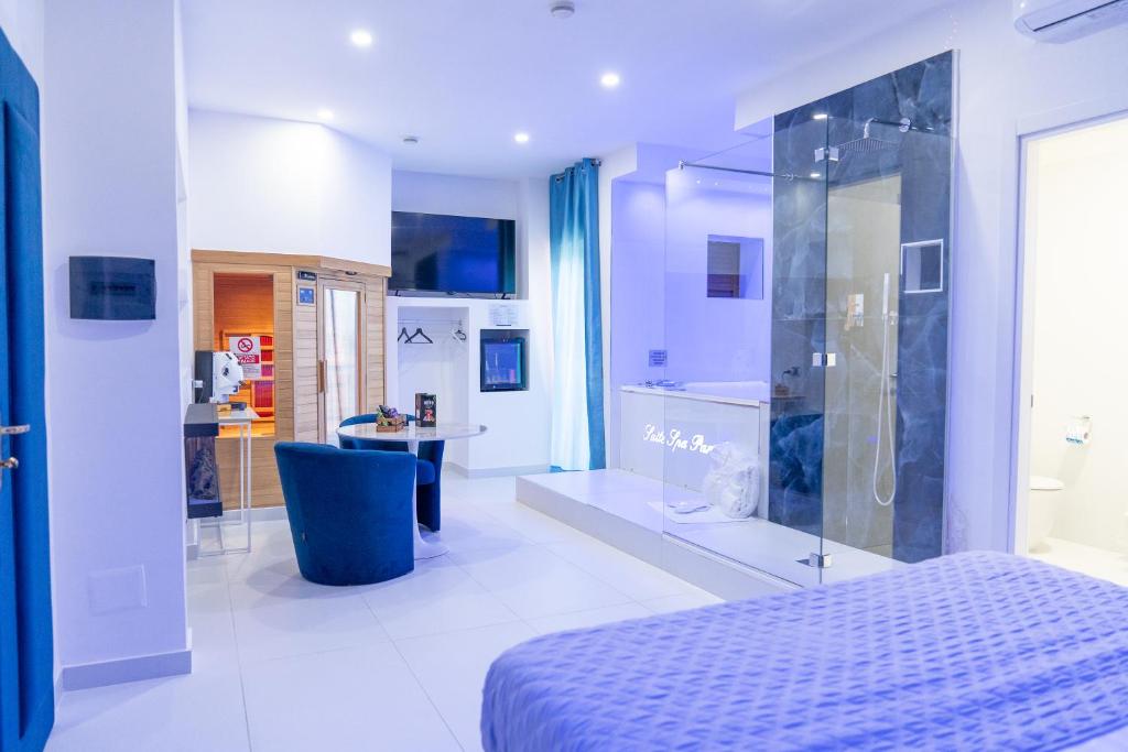TV a/nebo společenská místnost v ubytování Hotel Paradiso