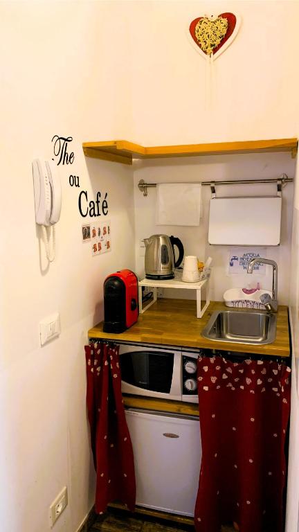 Kuchyň nebo kuchyňský kout v ubytování Villa ai Tigli Venezia GUEST HOUSE