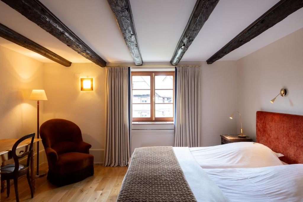 Postel nebo postele na pokoji v ubytování Hôtel à la Ferme