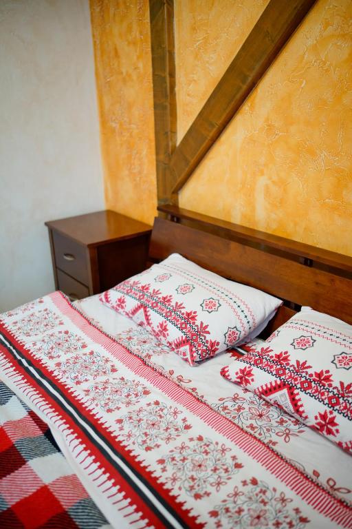 Postel nebo postele na pokoji v ubytování Готель Добрій
