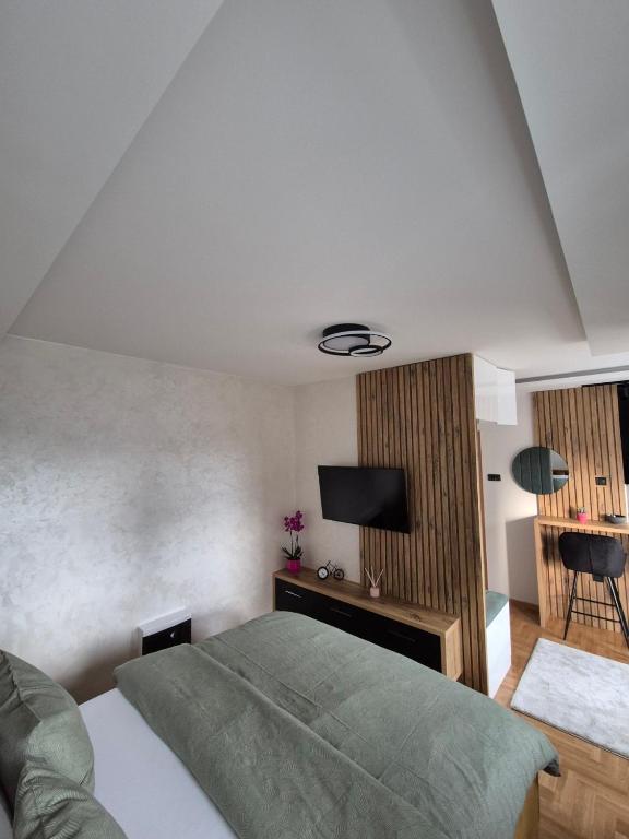Postel nebo postele na pokoji v ubytování Apartman Milica