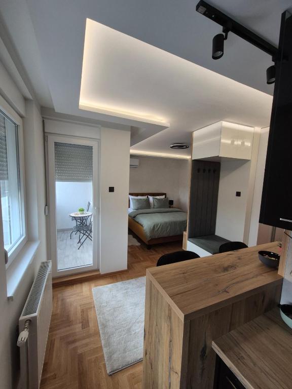 Postel nebo postele na pokoji v ubytování Apartman Milica