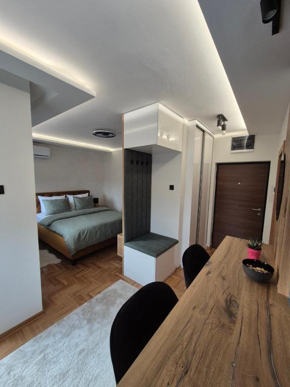 Postel nebo postele na pokoji v ubytování Apartman Milica