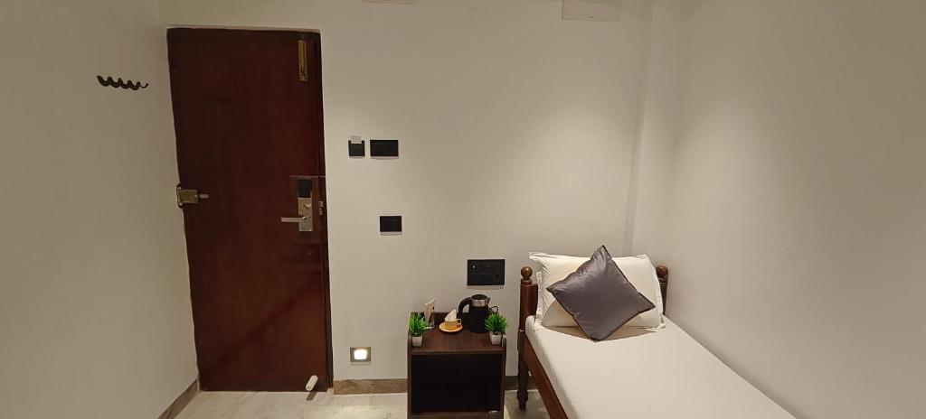 Postel nebo postele na pokoji v ubytování Woodlands Inn