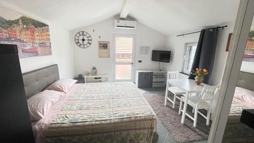 Кровать или кровати в номере Casa Portofino