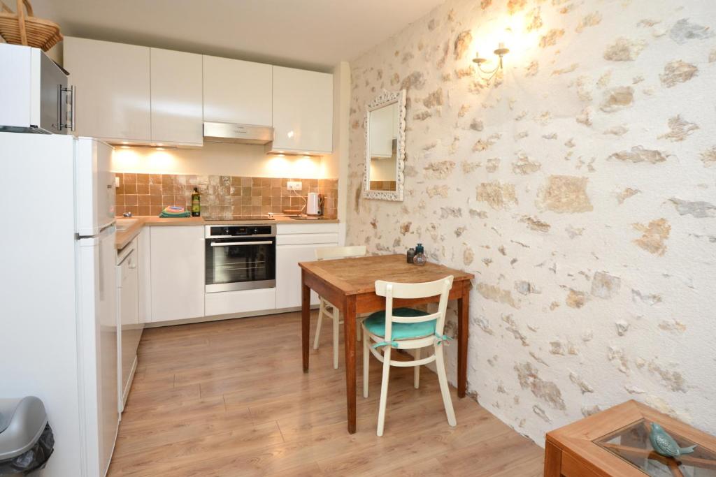 Kuchyň nebo kuchyňský kout v ubytování Maison Le Petit Balcon Beaucaire