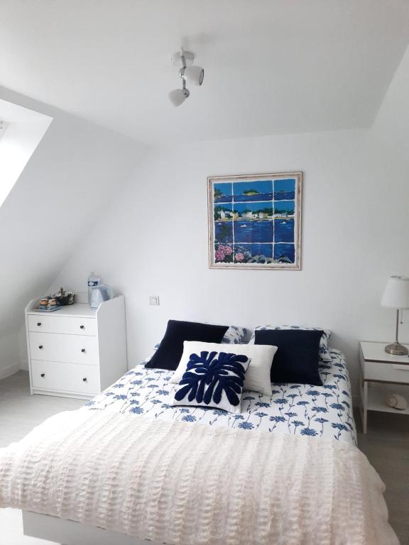 Ένα ή περισσότερα κρεβάτια σε δωμάτιο στο Chambre d'hôtes avec petit-déjeuner