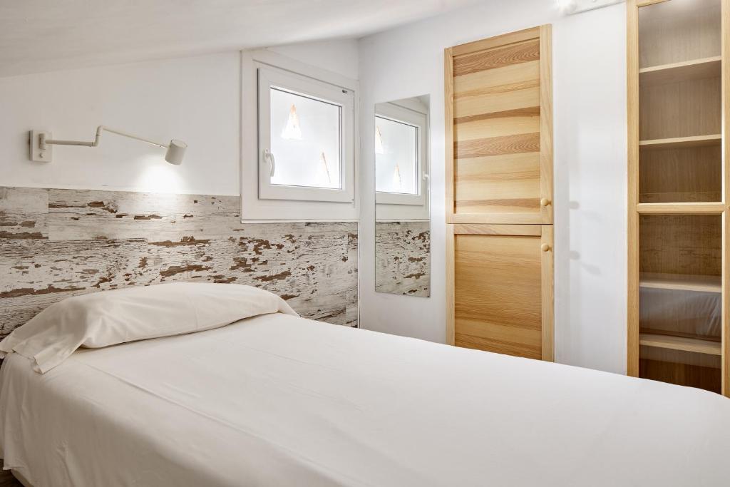Postel nebo postele na pokoji v ubytování Hotel Flysch