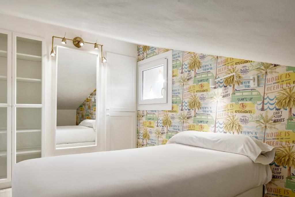 Postel nebo postele na pokoji v ubytování Hotel Flysch