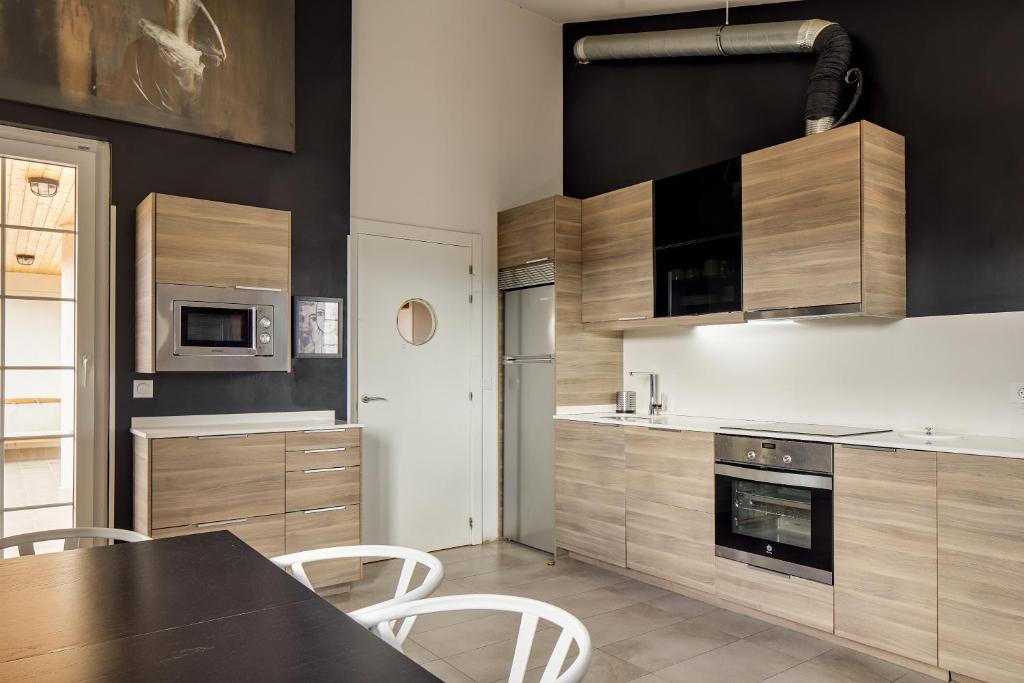 Kuchyň nebo kuchyňský kout v ubytování Hotel Flysch
