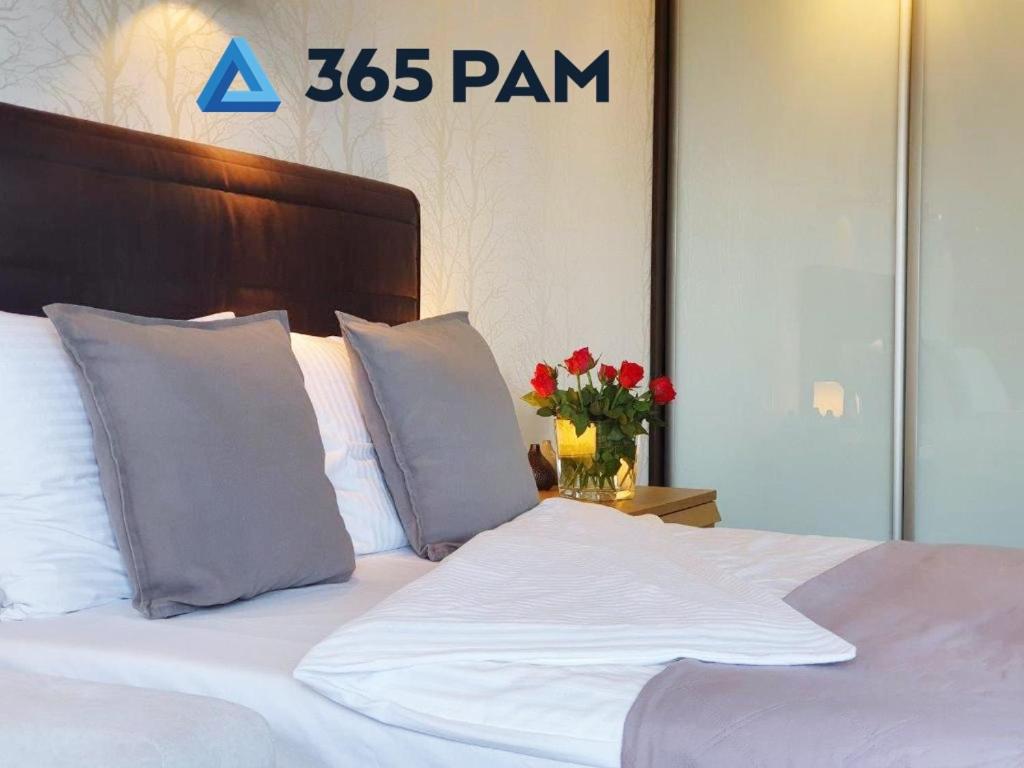 Posteľ alebo postele v izbe v ubytovaní Europa Apartament - 365PAM