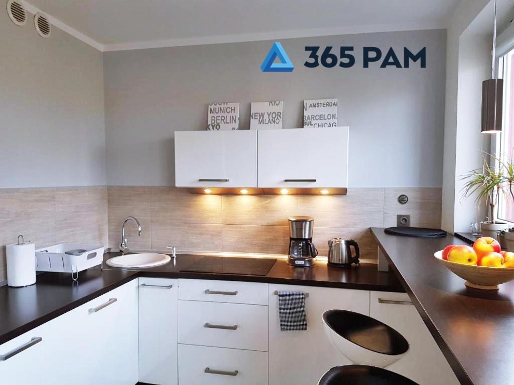 Kuchyňa alebo kuchynka v ubytovaní Europa Apartament - 365PAM