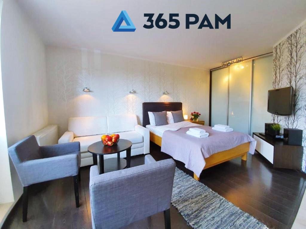 Posteľ alebo postele v izbe v ubytovaní Europa Apartament - 365PAM