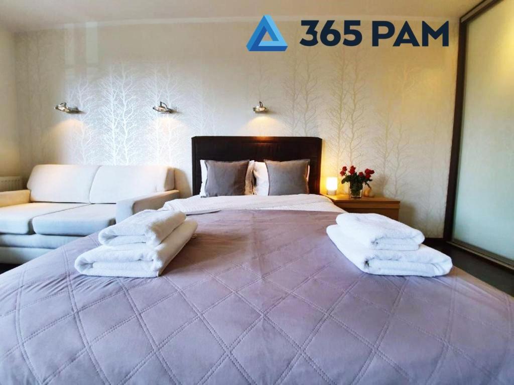 Posteľ alebo postele v izbe v ubytovaní Europa Apartament - 365PAM