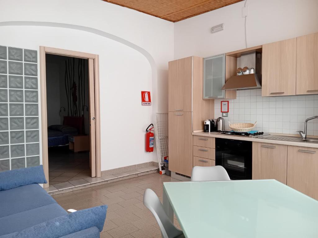 Kuchyň nebo kuchyňský kout v ubytování Relais Al Faro Bed&Breakfast
