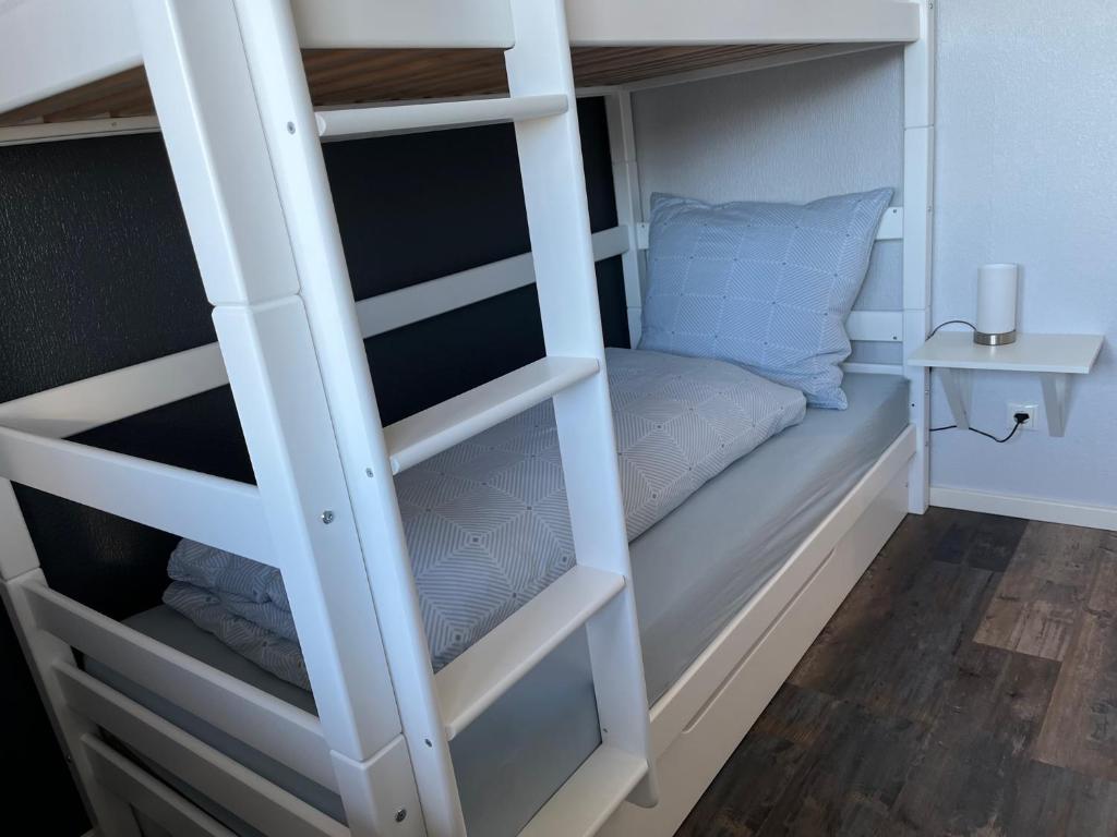 Palanda nebo palandy na pokoji v ubytování Haus Blumenglück