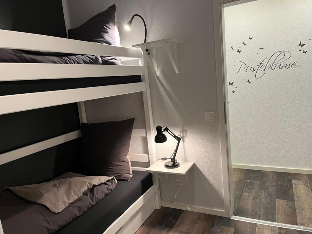 Postel nebo postele na pokoji v ubytování Haus Blumenglück