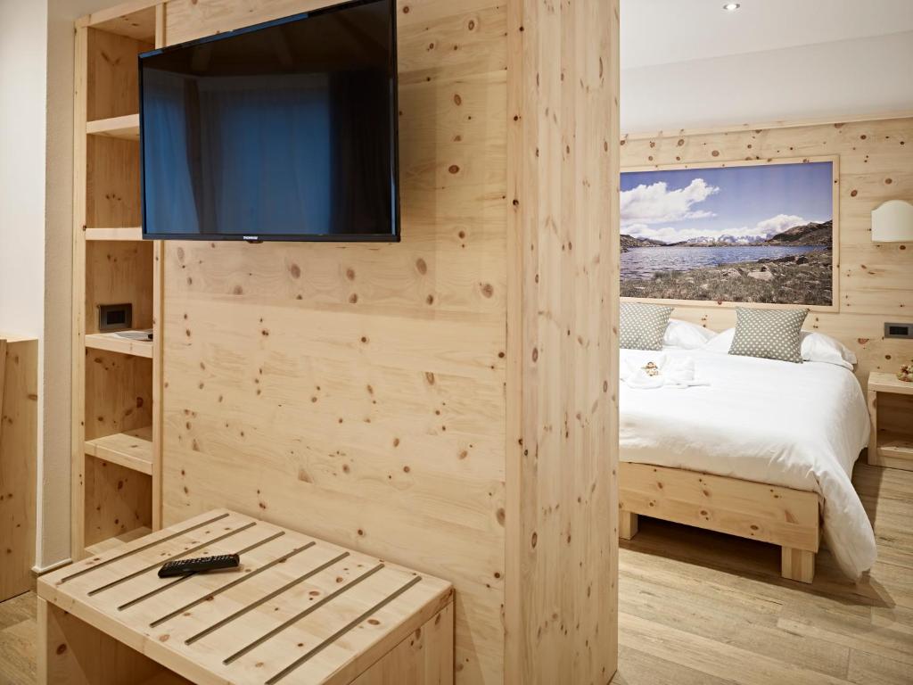 Postel nebo postele na pokoji v ubytování B&B Augusto