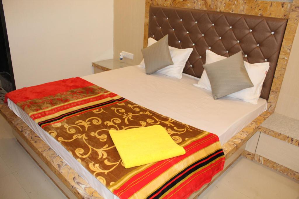 Postel nebo postele na pokoji v ubytování Hotel Skylark